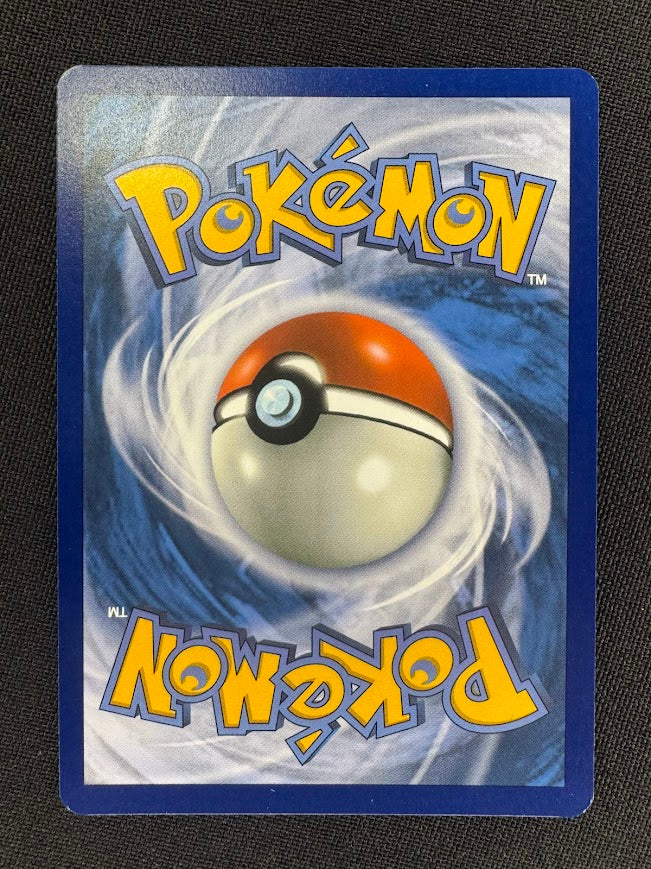 Rear view of the Heatflame Mask Ogerpon ex SIR 212/167 – Twilight Masquerade Pokémon Card.